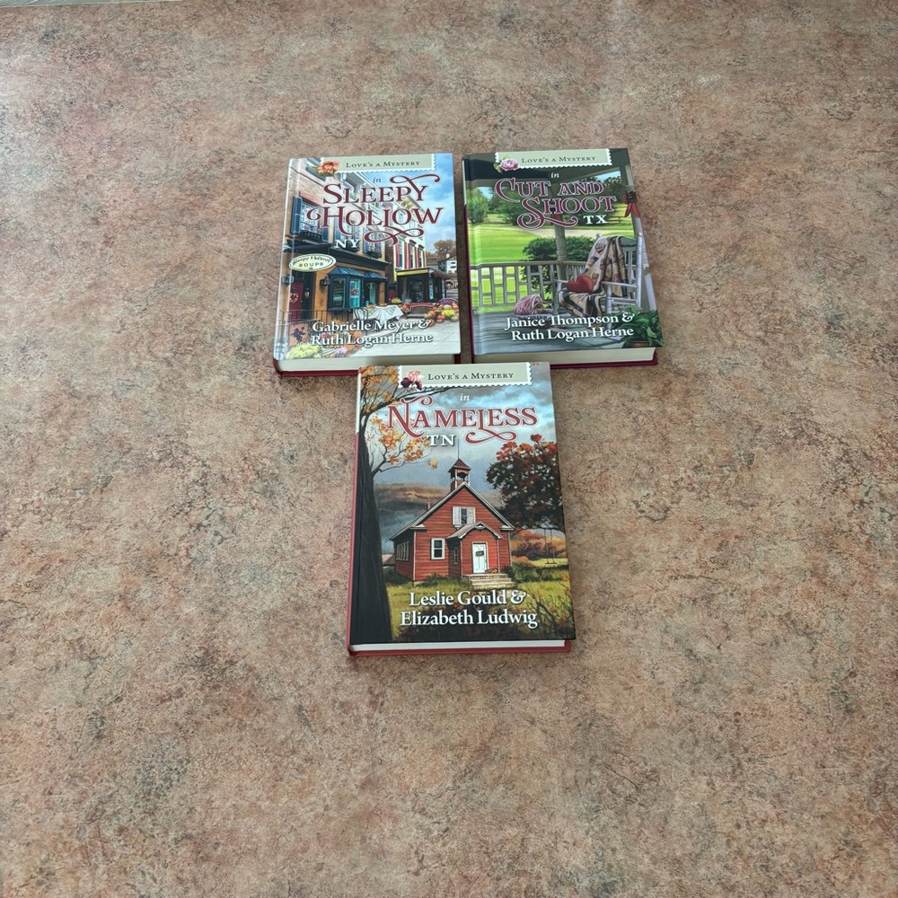 Set of 3 Love’s a Mystery Hardcover books